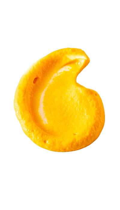 Foto aislada de una gota de salsa mostaza.